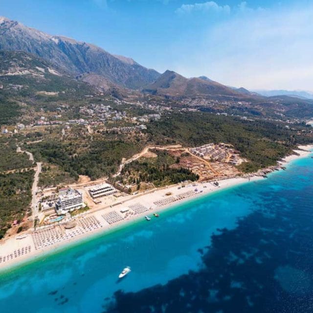 https://mydentaltour.com/wp-content/uploads/2025/01/dhermi-beach-1-640x640.jpg